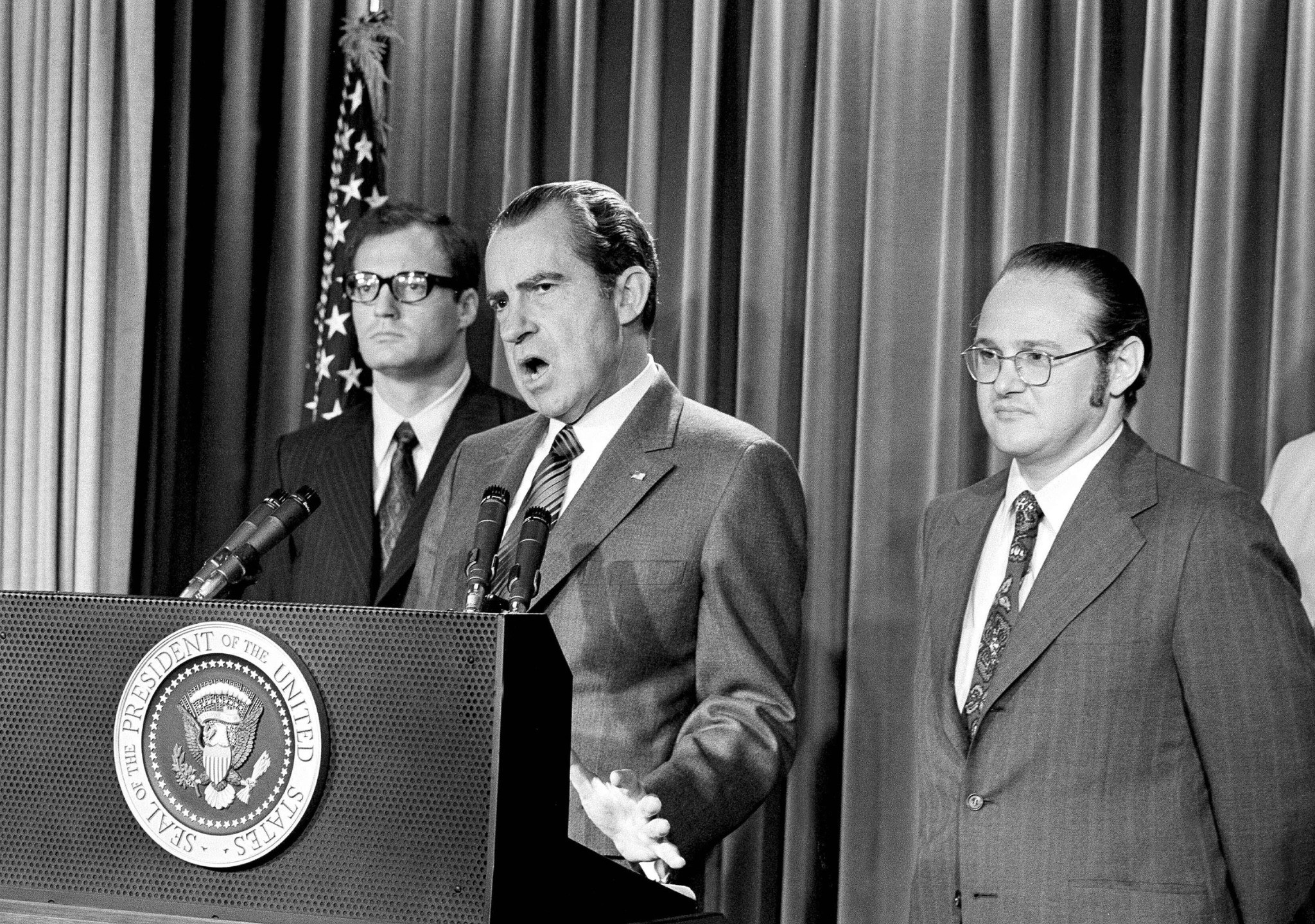 President Richard Nixon speaking at a podium